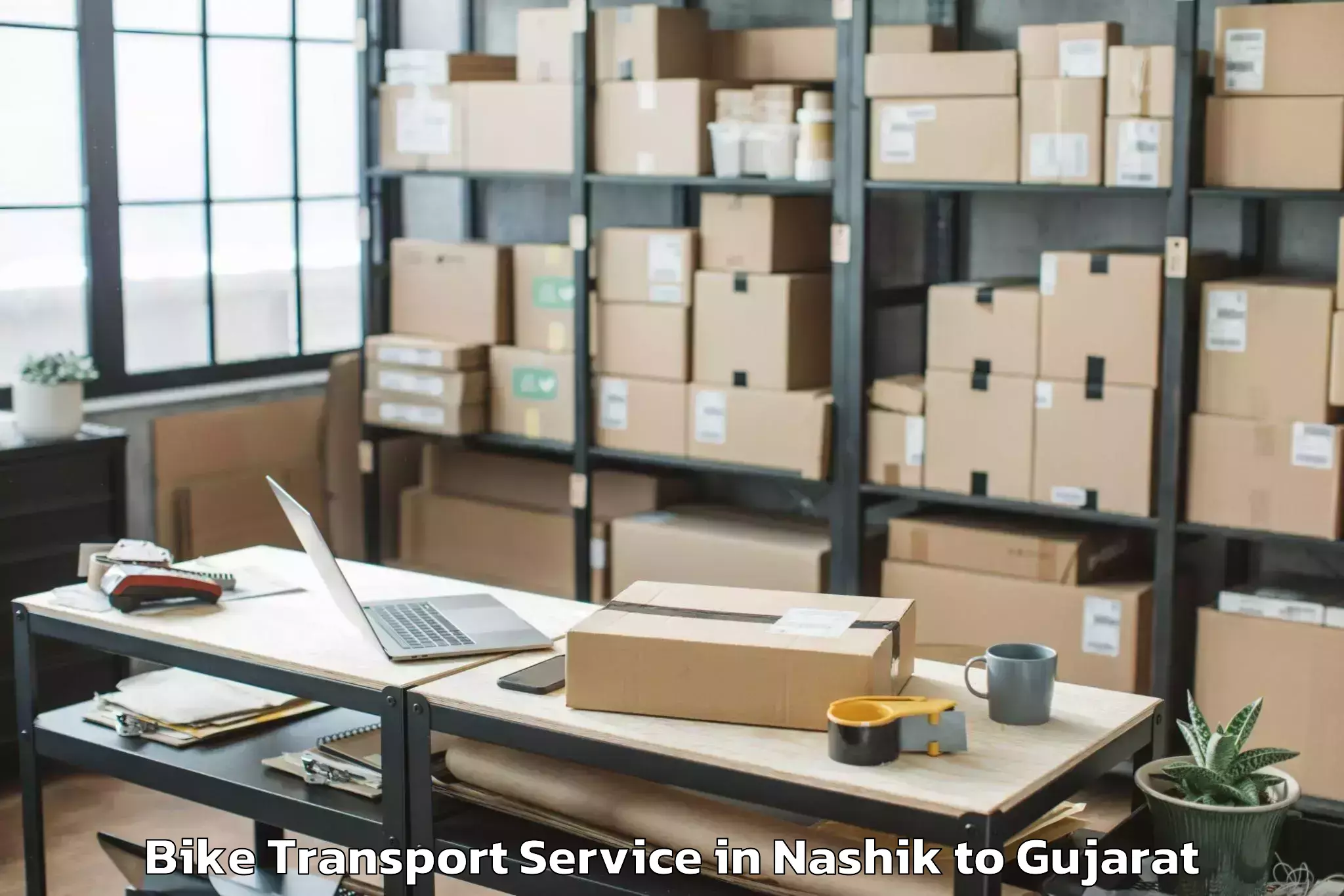 Book Nashik to Jhagadia Bike Transport